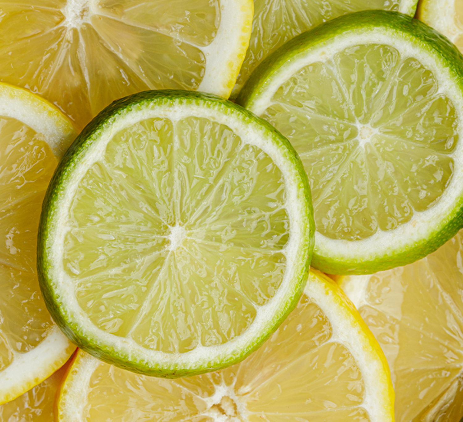 Fresh lemon and lime slices background for Long Run Lemon-Lime cocktail mixer